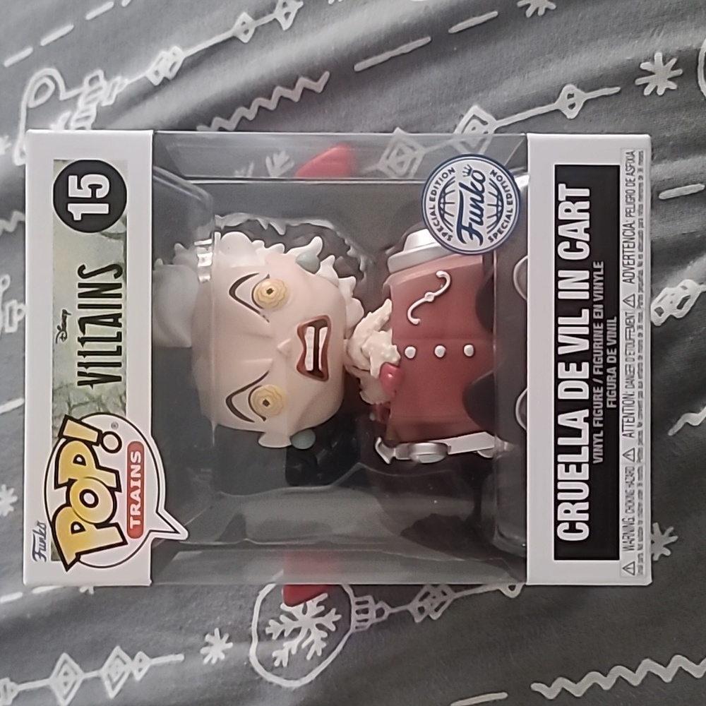 Cruella De vil in cart pop